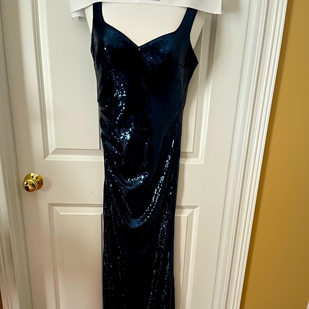 Once worn long dress. Blue Sequins. Size 4. Purchased at Neiman Marcus.